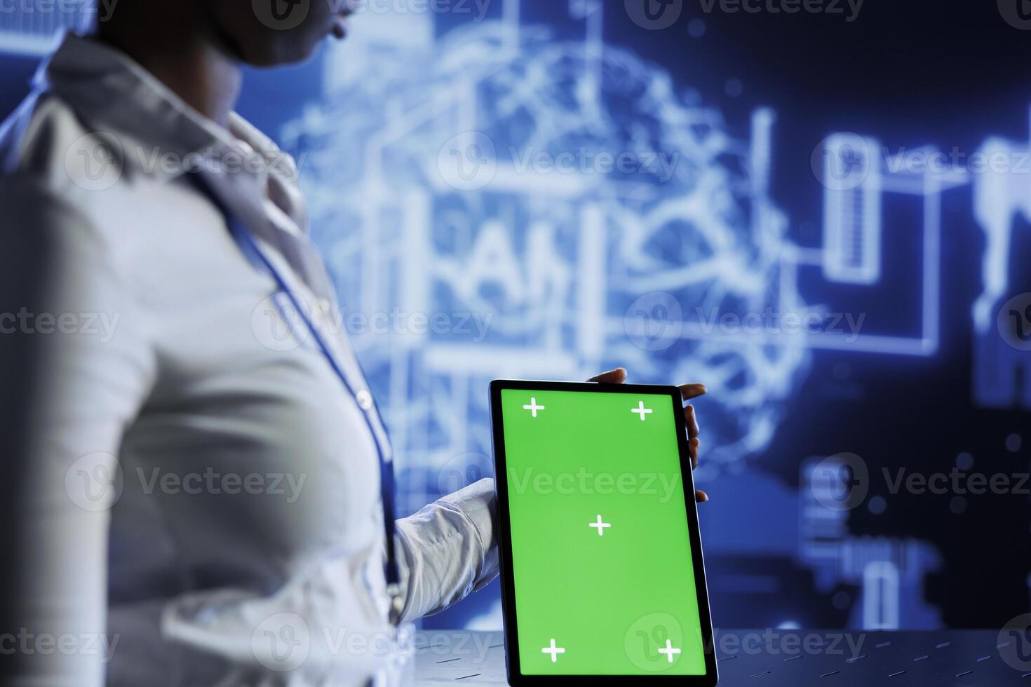 Experienced developer uses mockup tablet to update neural networks, writing intricate binary code scripts on tablet. Worker uses isolated screen device programming to upgrade AI simulation model photo
