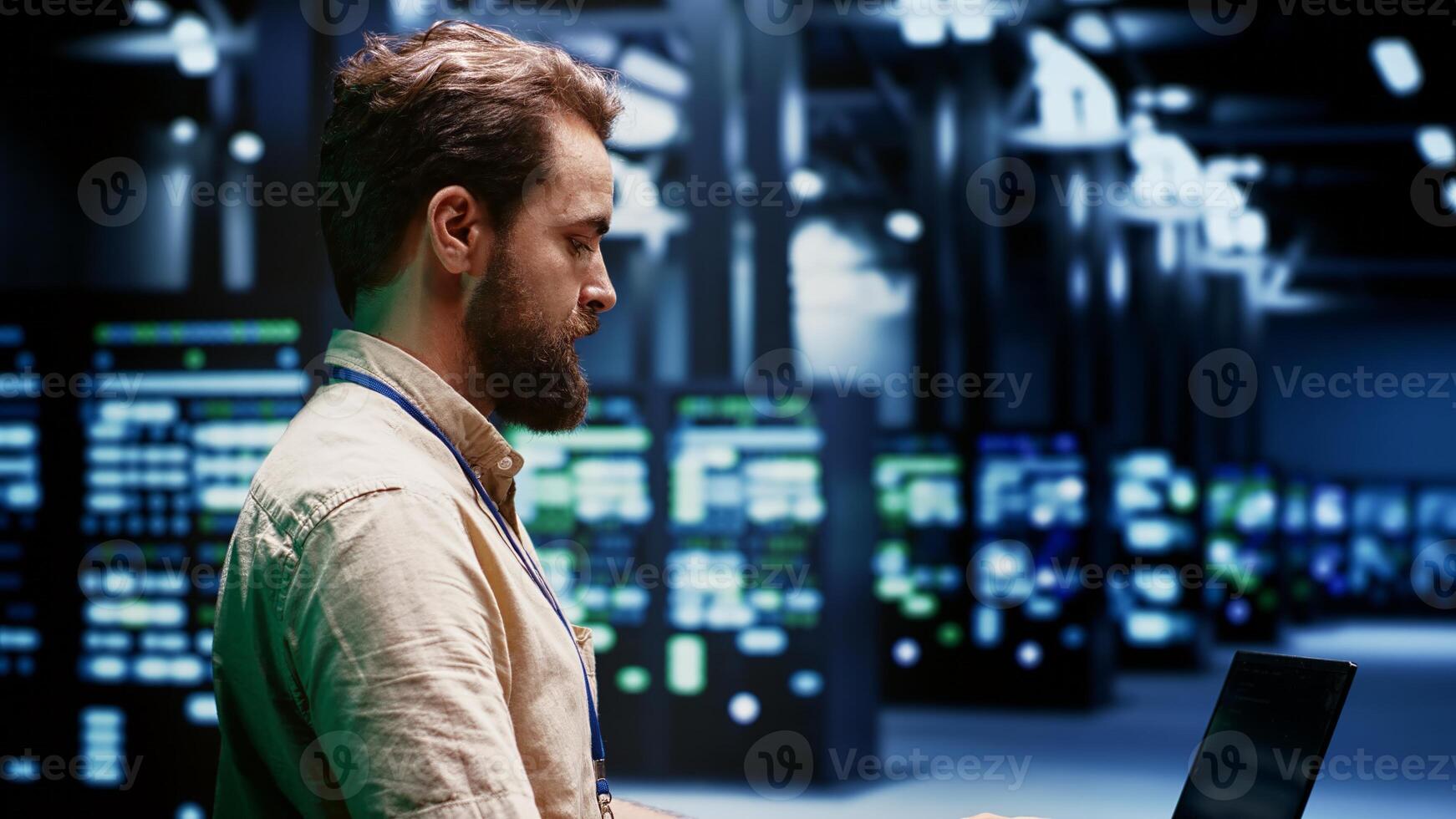 Engineer servicing server clusters with high computing power enabling hyperscale data center to support demanding applications, including artificial intelligence and machine learning workloads photo