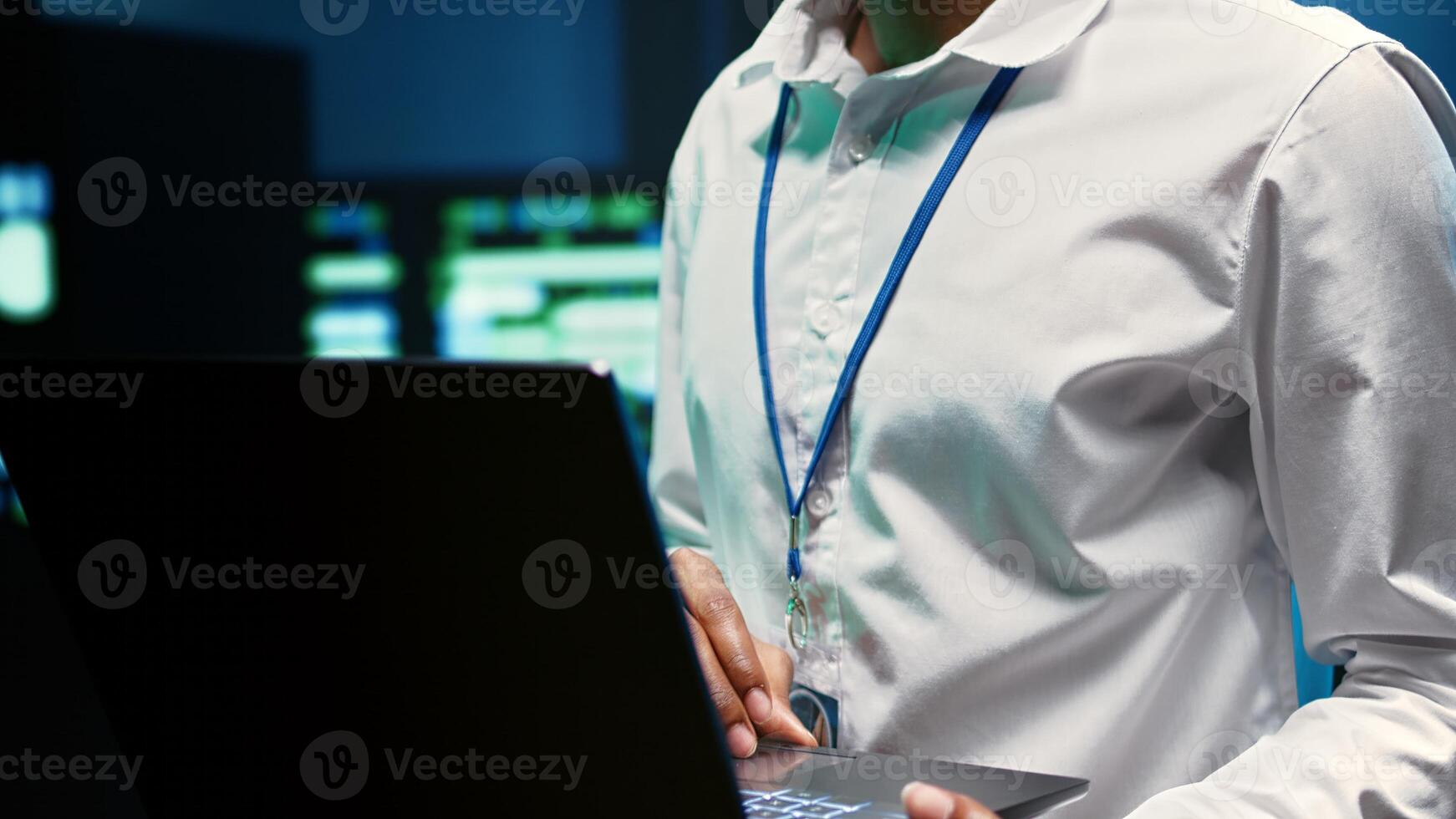 Experienced engineer in data center fixing network issues affecting server performance and connectivity, leading to slow transfer rates and poor client communication, close up photo