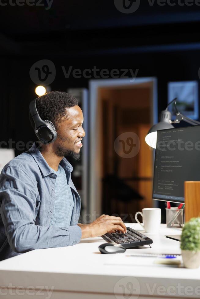 Computer specialist working on html programming script, person with IT expertise operating through terminal window. Self employed technician debugging server for security and privacy. photo