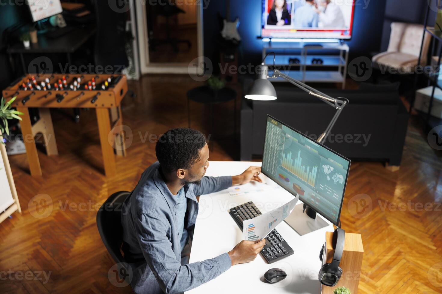 Financial analyst checking legal documents and online balance to calculate cost and revenue elements, doing accounting work at home. Economist looking into capital funds analysis for budget review. photo