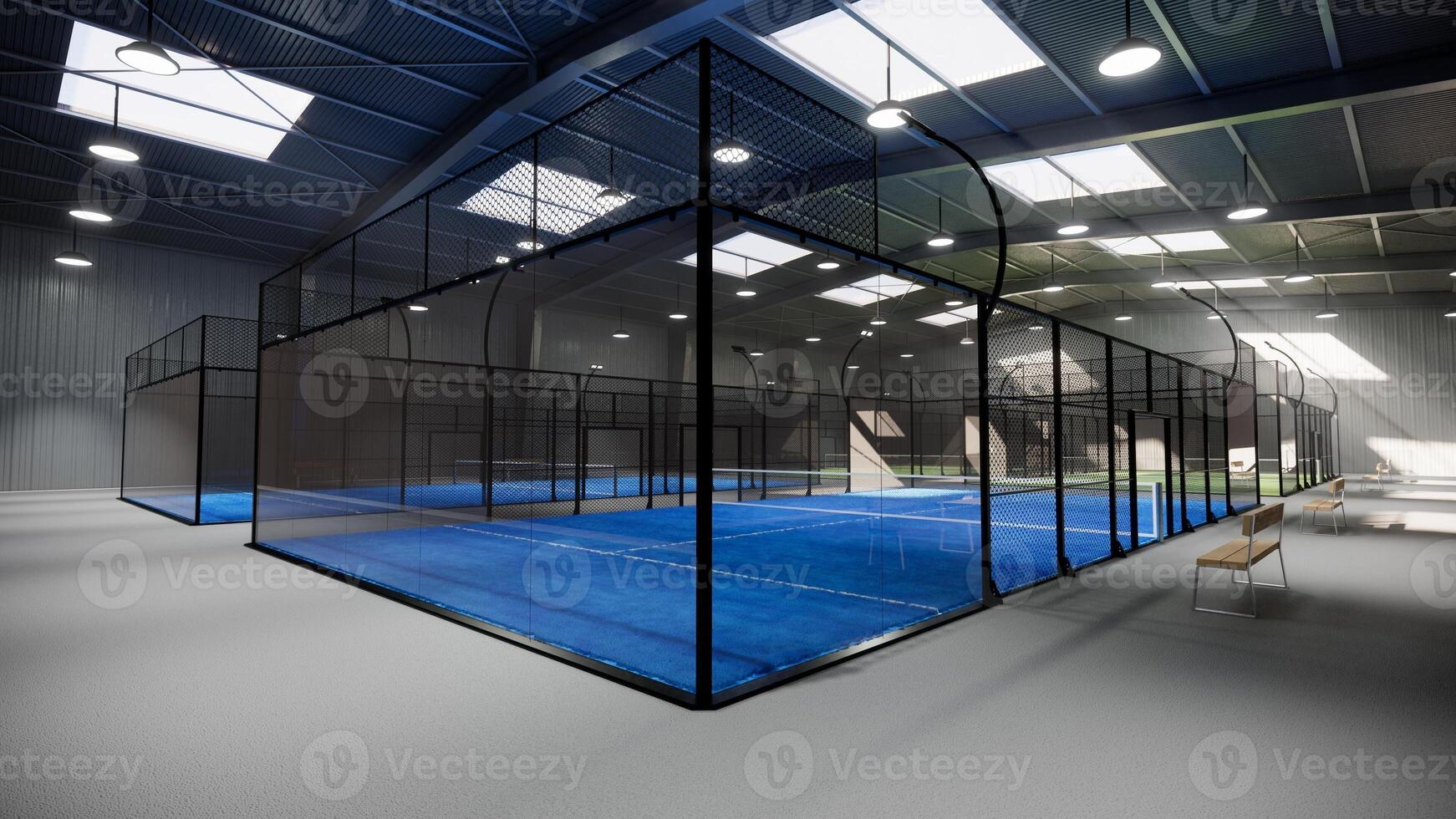 visualization of blue padel tennis courts inside a warehouse building, situated in the sports complex facility area. With lighting fixtures illuminated during the day photo