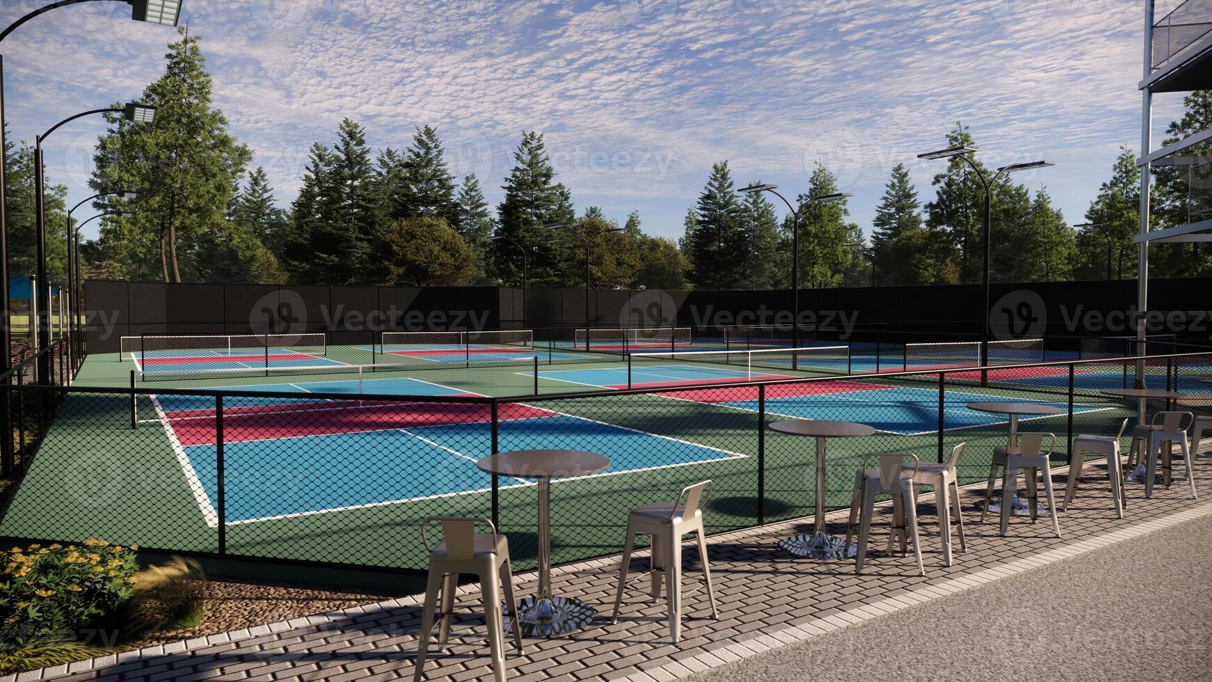 Visualization of empty pickleball courts with a mix of red, blue, and green floors and white lines, surrounded by trees and equipped with lights, fencing, and seating photo