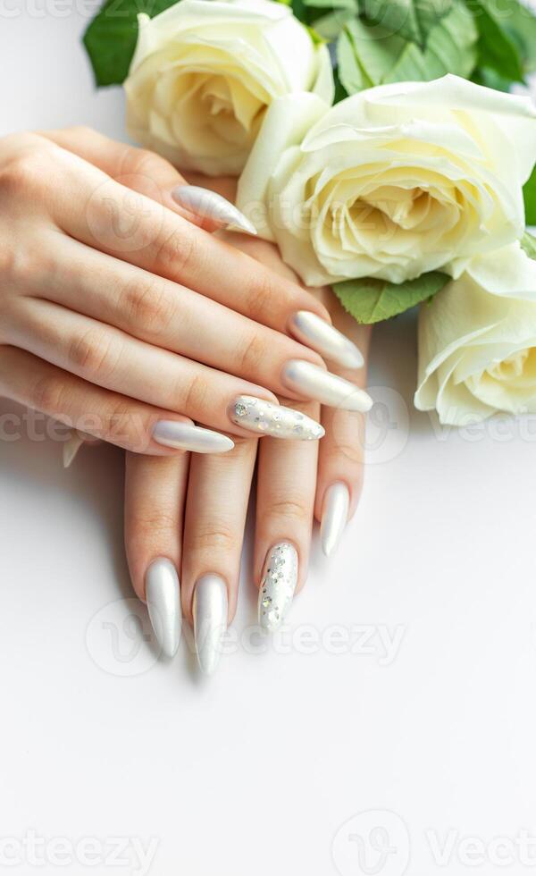 Female Hands with beautiful pearl manicure photo