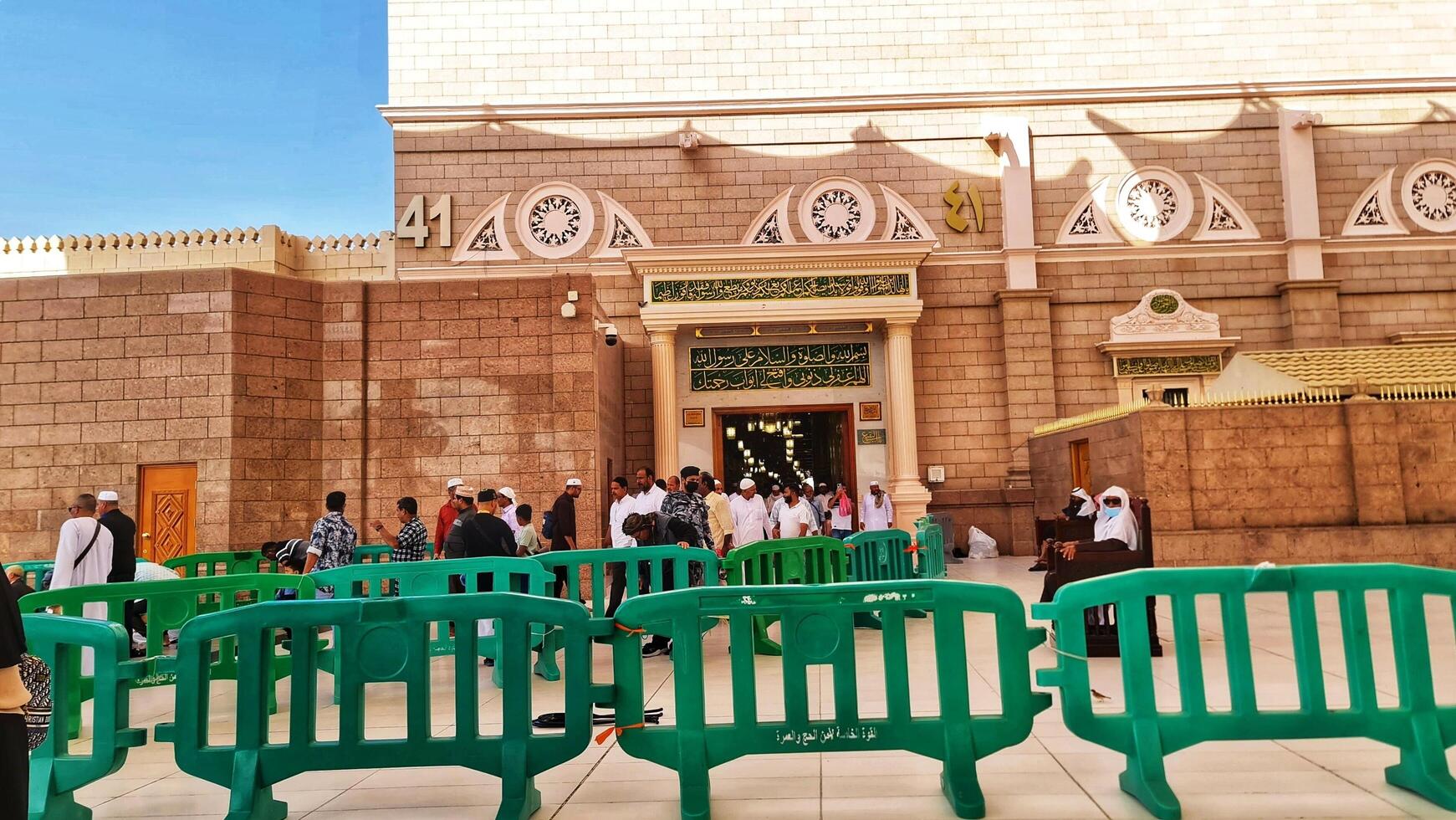 Medina, Saudi Arabia on March 1, 2024. Queues of female Umrah pilgrims from all over the world line up to enter Raudhah or the Tomb of the Prophet Muhammad. Gate 37. Use a registered Tasreh or Nusuk. photo
