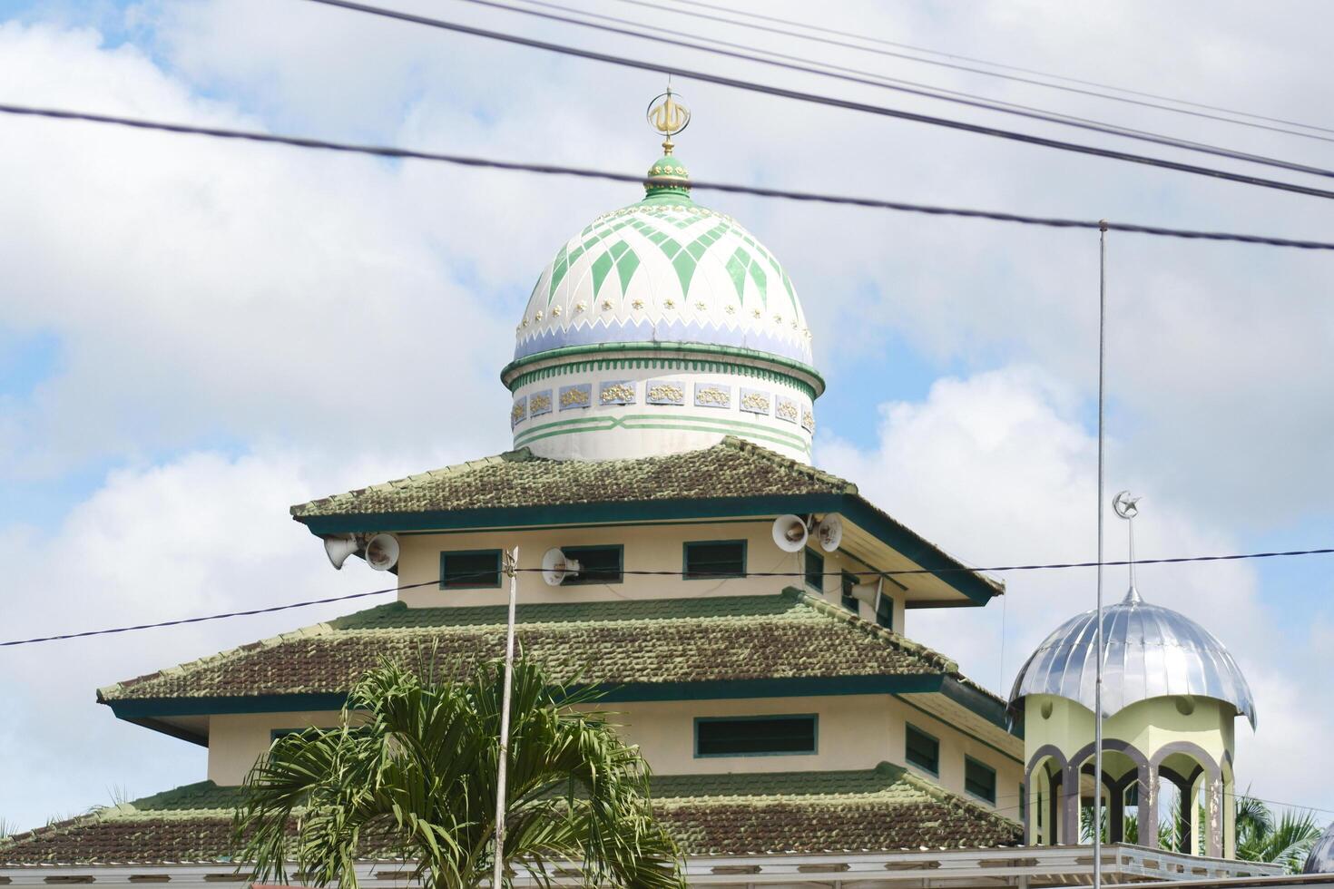 photography of mosque dome with sky background during the day photo
