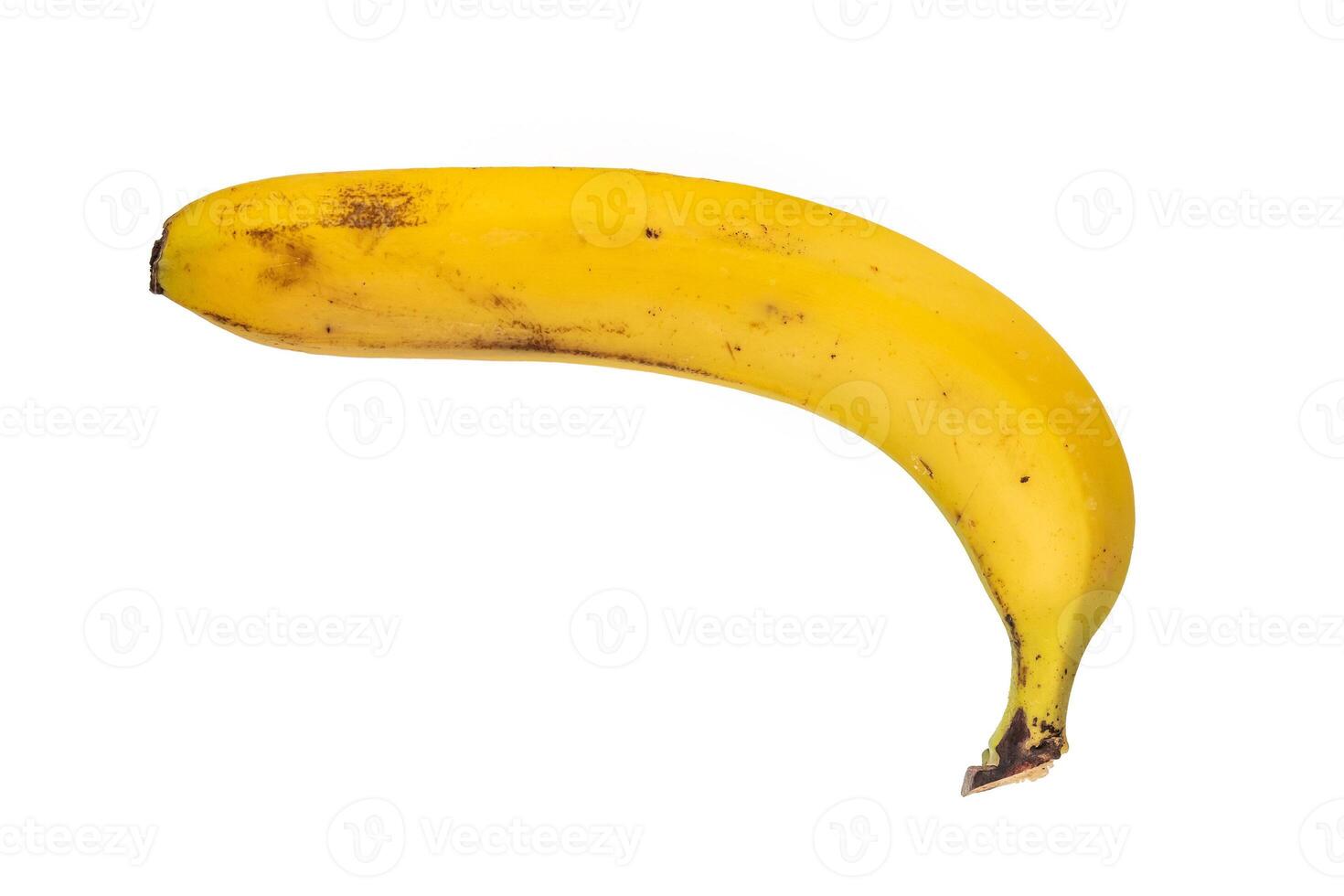 banana - one ripe yellow banana fruit in the peel, isolated on white photo