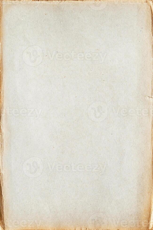 sheet of old blank yellowed paper with crumpled edges - paper texture photo