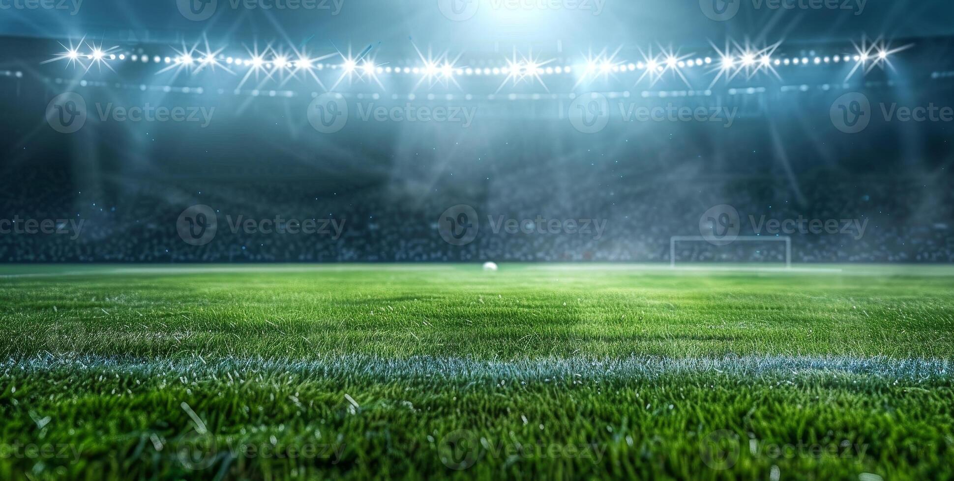 Empty soccer stadium with bright lights shining on lush green grass, ready for an exciting match under the night sky. photo