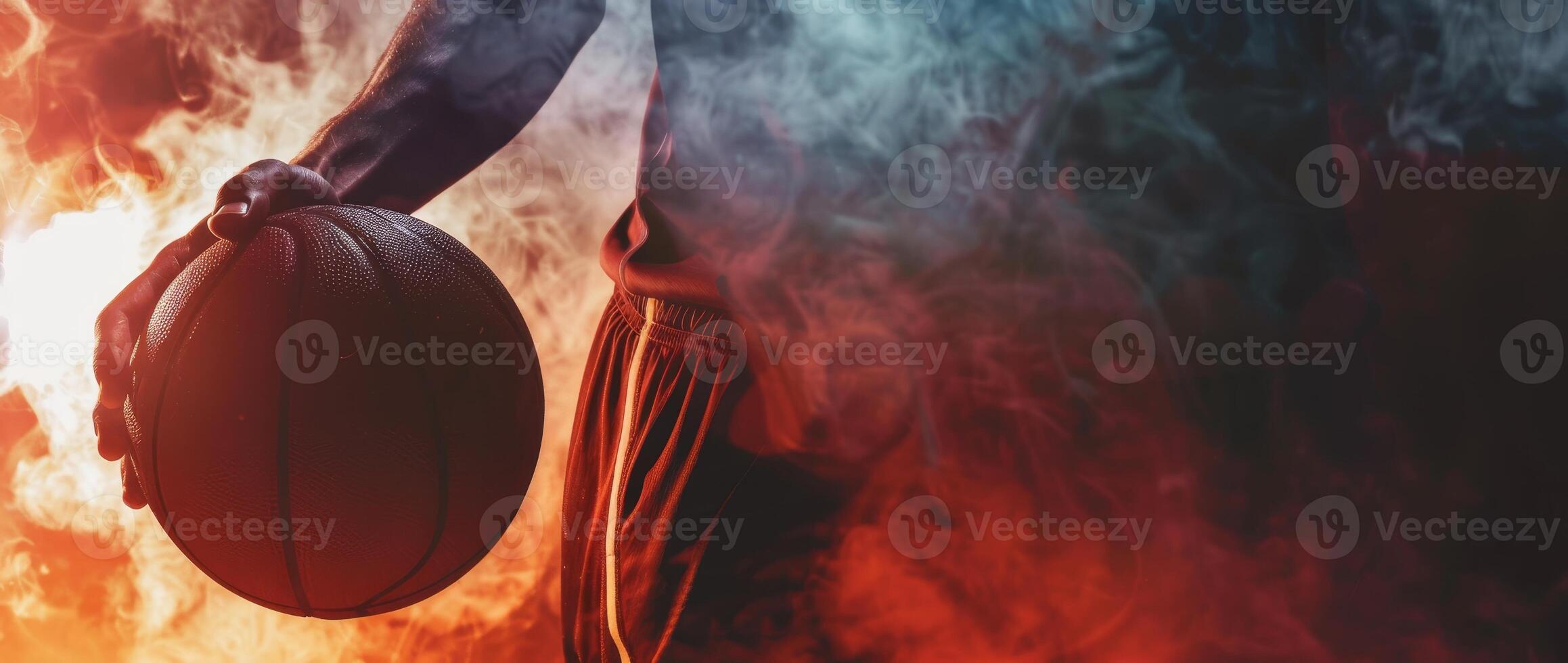 Dramatic close-up of a basketball player holding a ball surrounded by colorful smoke, highlighting intensity and action in sports. photo
