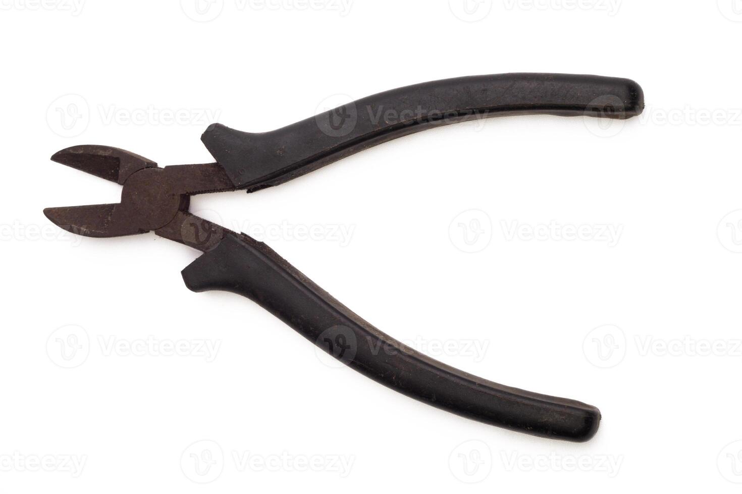 Old rusty pliers, isolated on white background, top view photo