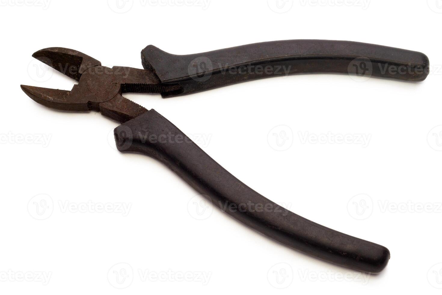 Old rusty pliers, isolated on white background photo