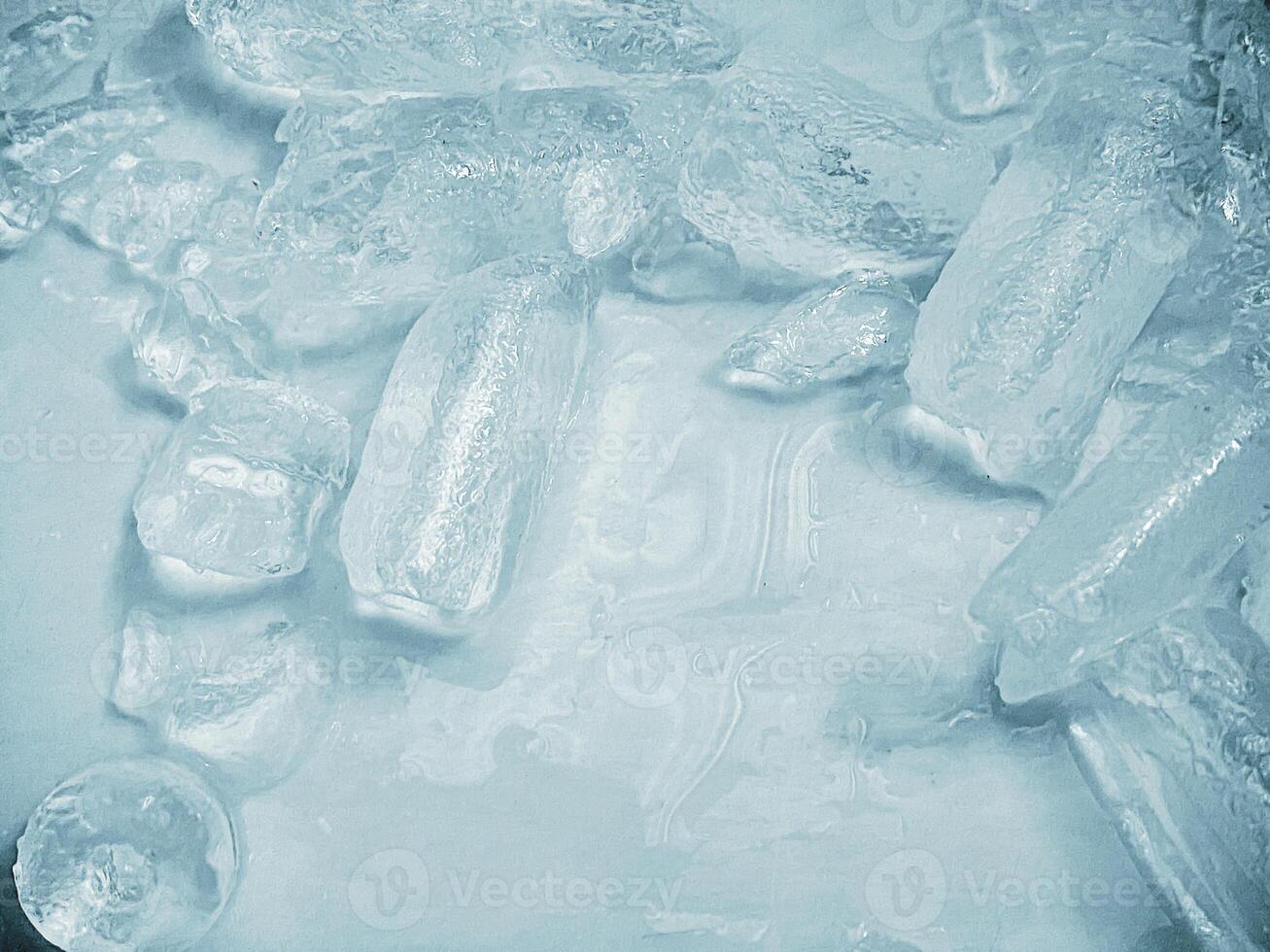 icecubes background,icecubes texture,icecubes wallpaper,ice helps to feel refreshed and cool water from the icecubes helps the water refresh your life and feel good.ice drinks for refreshment business photo