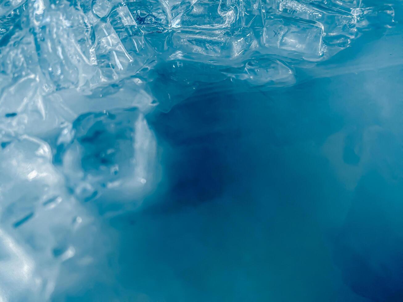 icecubes background,icecubes texture,icecubes wallpaper,ice helps to feel refreshed and cool water from the icecubes helps the water refresh your life and feel good.ice drinks for refreshment business photo