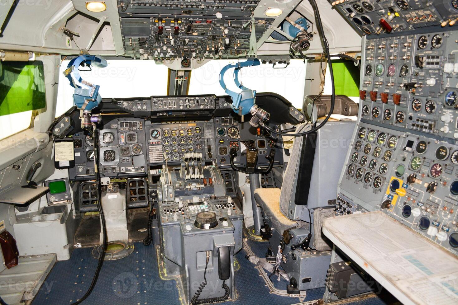 close up shot on helicopter console inside cockpit. Levers, parts and control buttons in the cockpit of an aircraft. photo