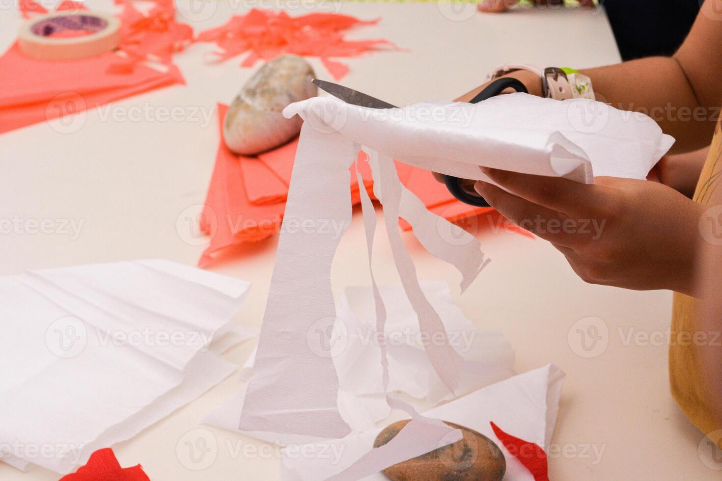 White table with various tools for child's crafts and creativity. photo