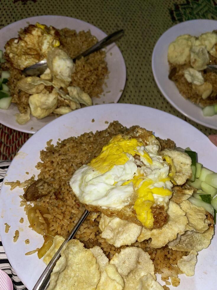 roadside fried rice with pickles and cucumber photo