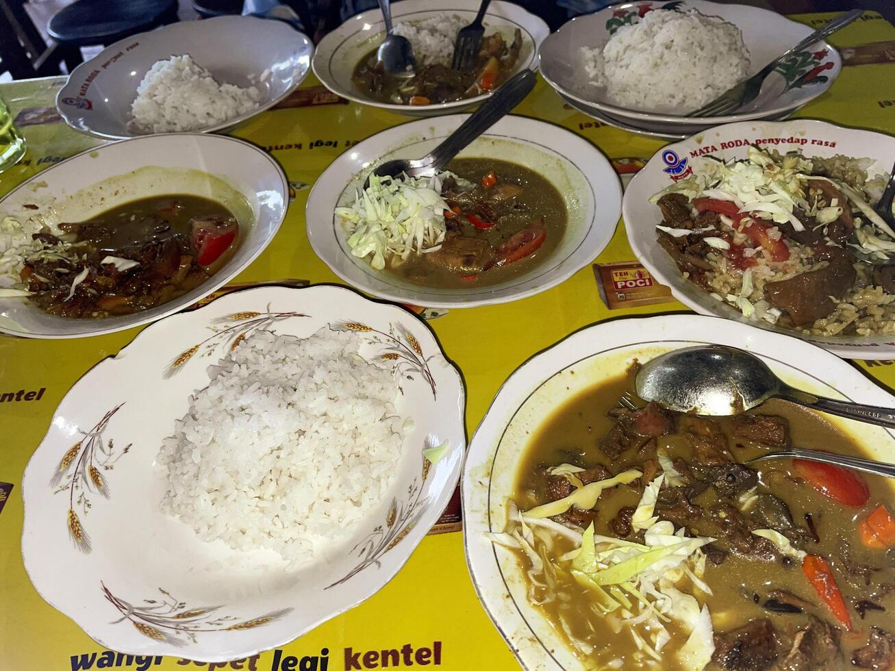 Indonesian food. Tongseng Ayam or Chicken Tongseng is a traditional Indonesian dish in the form of a savory meat soup with coconut milk and can be spicy or sweet photo