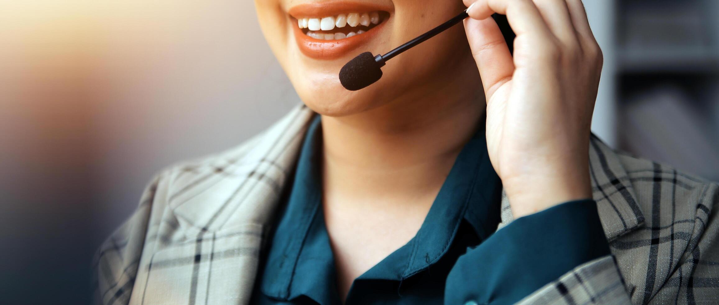 Call center, computer and business with woman in office for customer service, technical support and advice. Technology, contact us and communication with employee operator in help desk agency photo