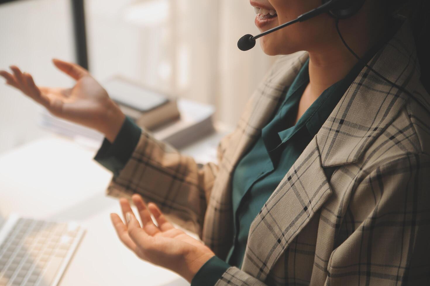 Call center, computer and business with woman in office for customer service, technical support and advice. Technology, contact us and communication with employee operator in help desk agency photo