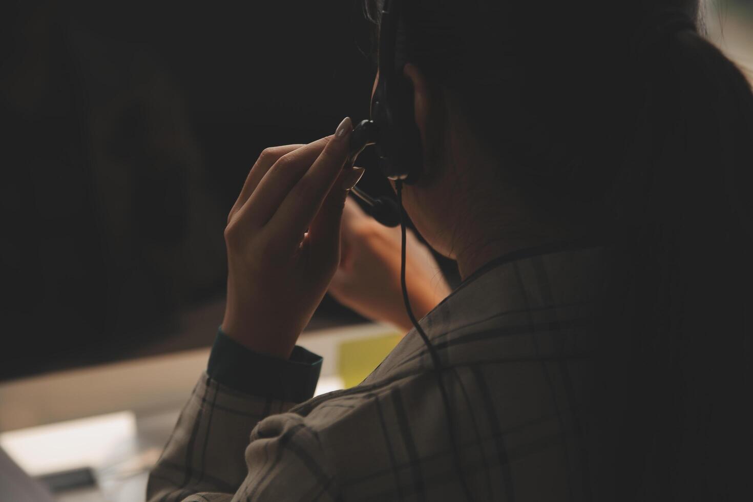 Call center, computer and business with woman in office for customer service, technical support and advice. Technology, contact us and communication with employee operator in help desk agency photo