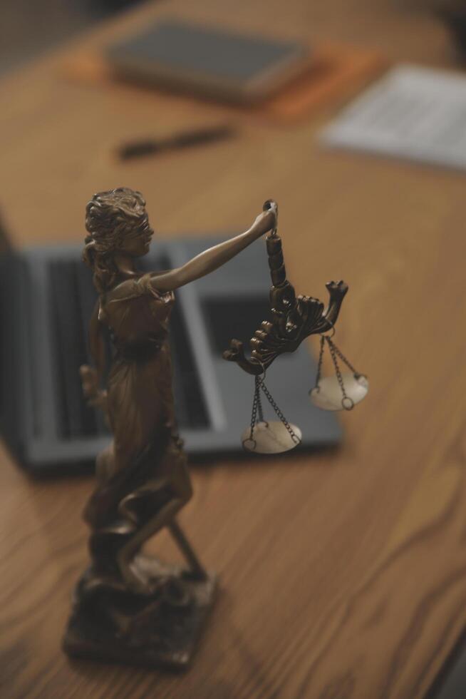 Judge gavel with Justice lawyers having team meeting at law firm background. Concepts of Law and Legal services. photo