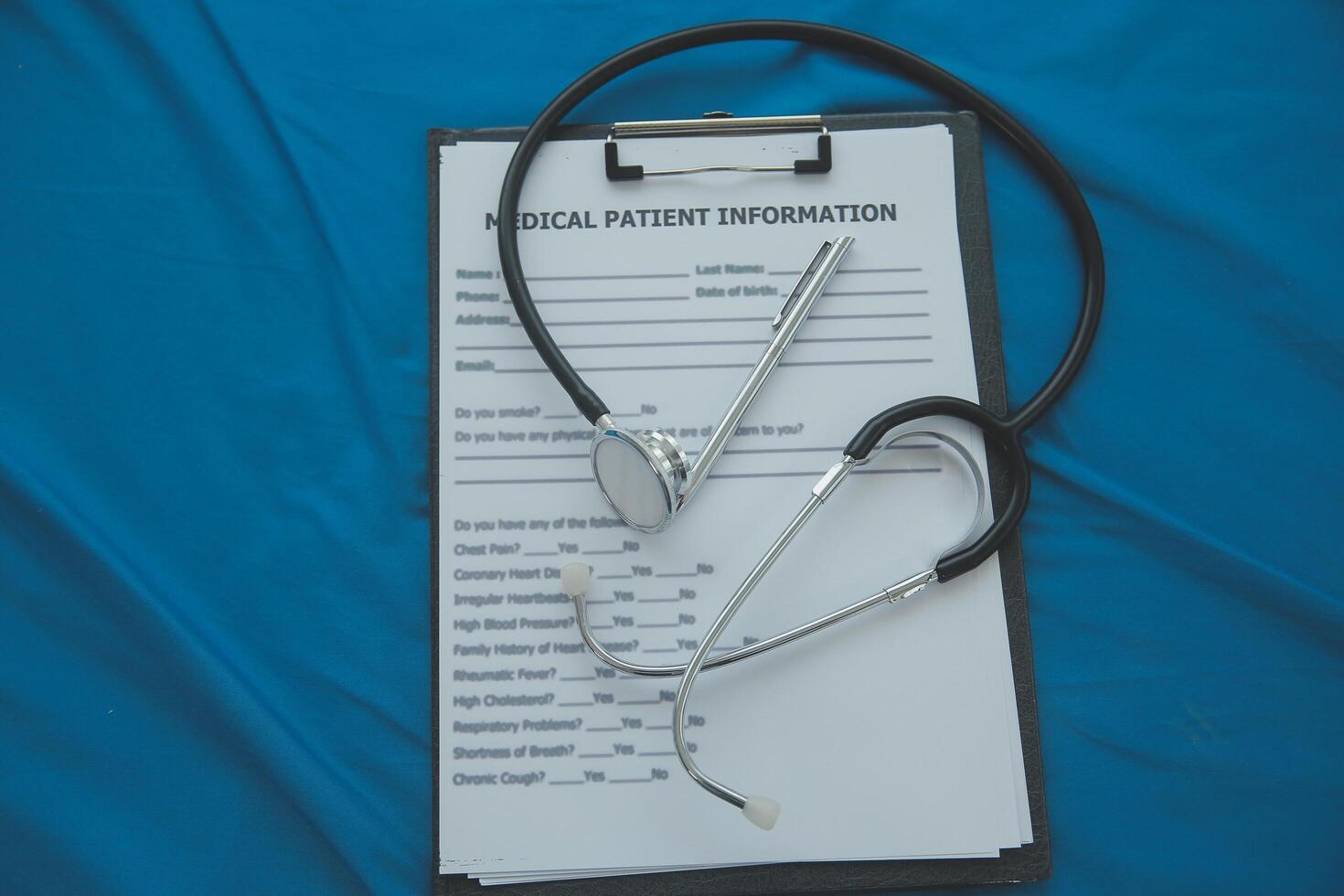 In a hospital setting, the presence of a doctor's physician book and stethoscope carries with it an air of professionalism and dedication to patient care. photo