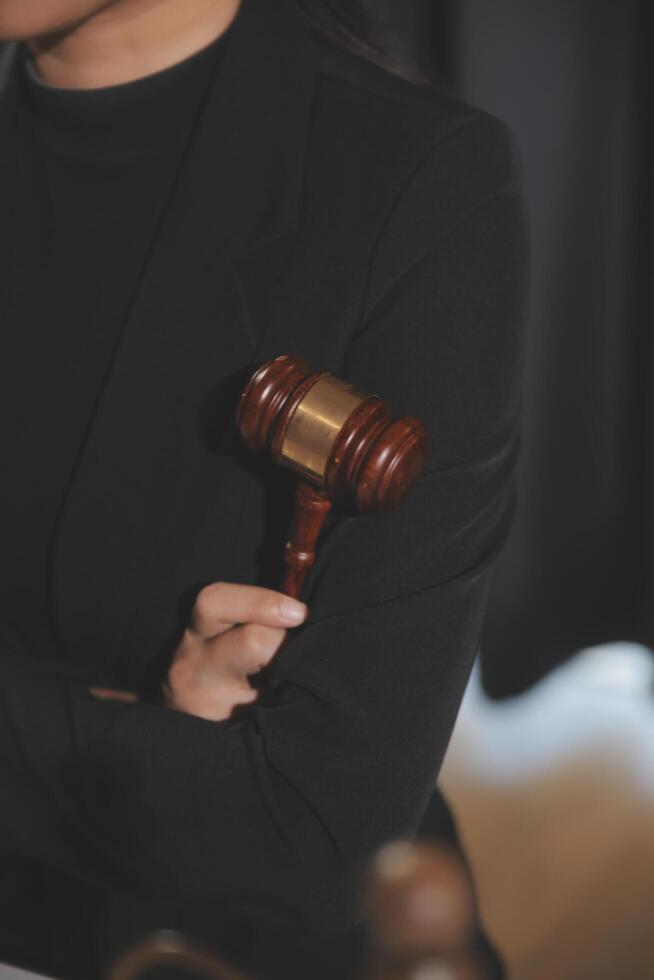Law theme, gavel or mallet of the judge, lawyer enforcement officers, evidence-based cases taken into account in the court abount business, legislation. photo