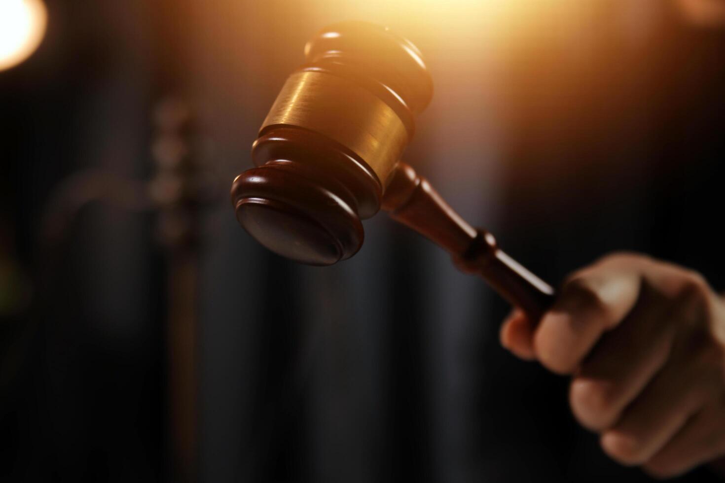Law theme, gavel or mallet of the judge, lawyer enforcement officers, evidence-based cases taken into account in the court abount business, legislation. photo