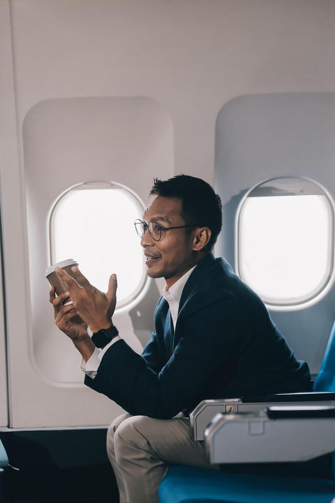 Businessman flying on his private jet. Concept about business, and transportation photo