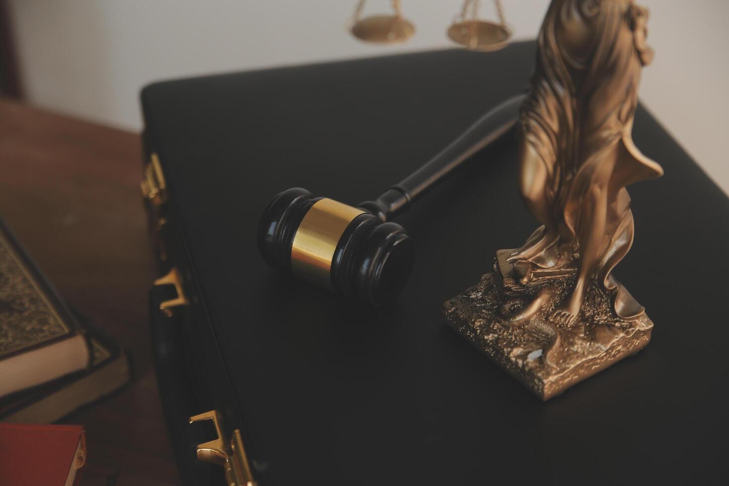 Lawyer, legal advisor, businessman brainstorming information on agreement details Business contracts in legal processing books for accuracy in contract documents. joint financial investment. photo