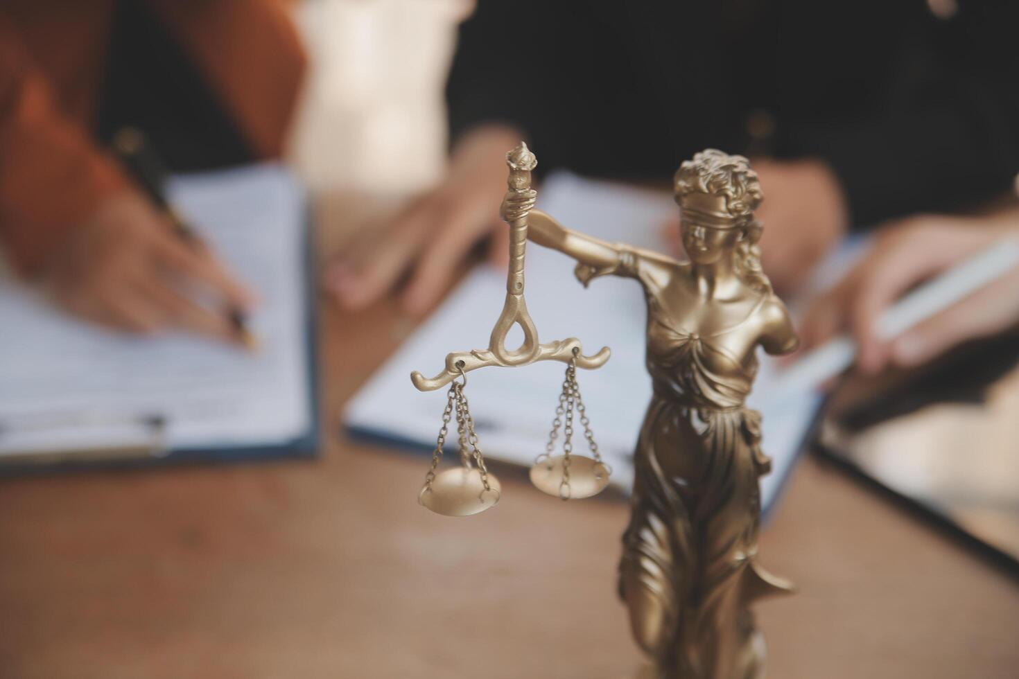 Lawyer, legal advisor, businessman brainstorming information on agreement details Business contracts in legal processing books for accuracy in contract documents. joint financial investment. photo