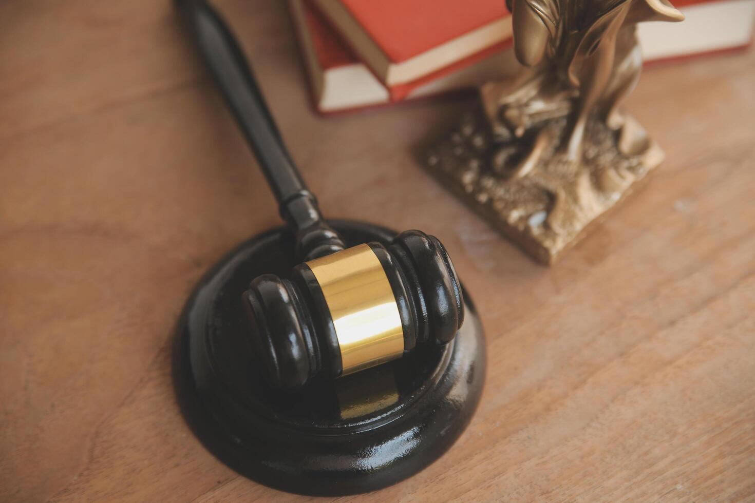 Lawyer, legal advisor, businessman brainstorming information on agreement details Business contracts in legal processing books for accuracy in contract documents. joint financial investment. photo