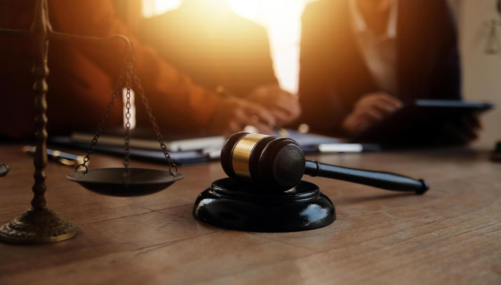 Lawyer, legal advisor, businessman brainstorming information on agreement details Business contracts in legal processing books for accuracy in contract documents. joint financial investment. photo