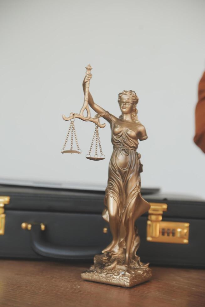 Lawyer, legal advisor, businessman brainstorming information on agreement details Business contracts in legal processing books for accuracy in contract documents. joint financial investment. photo