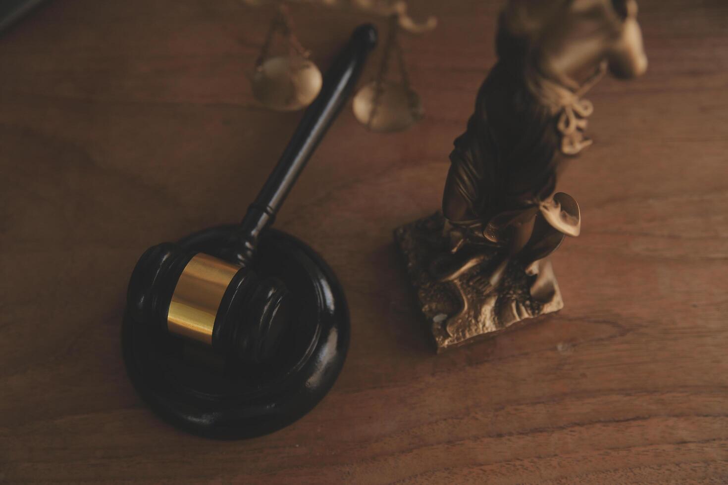 Lawyer, legal advisor, businessman brainstorming information on agreement details Business contracts in legal processing books for accuracy in contract documents. joint financial investment. photo