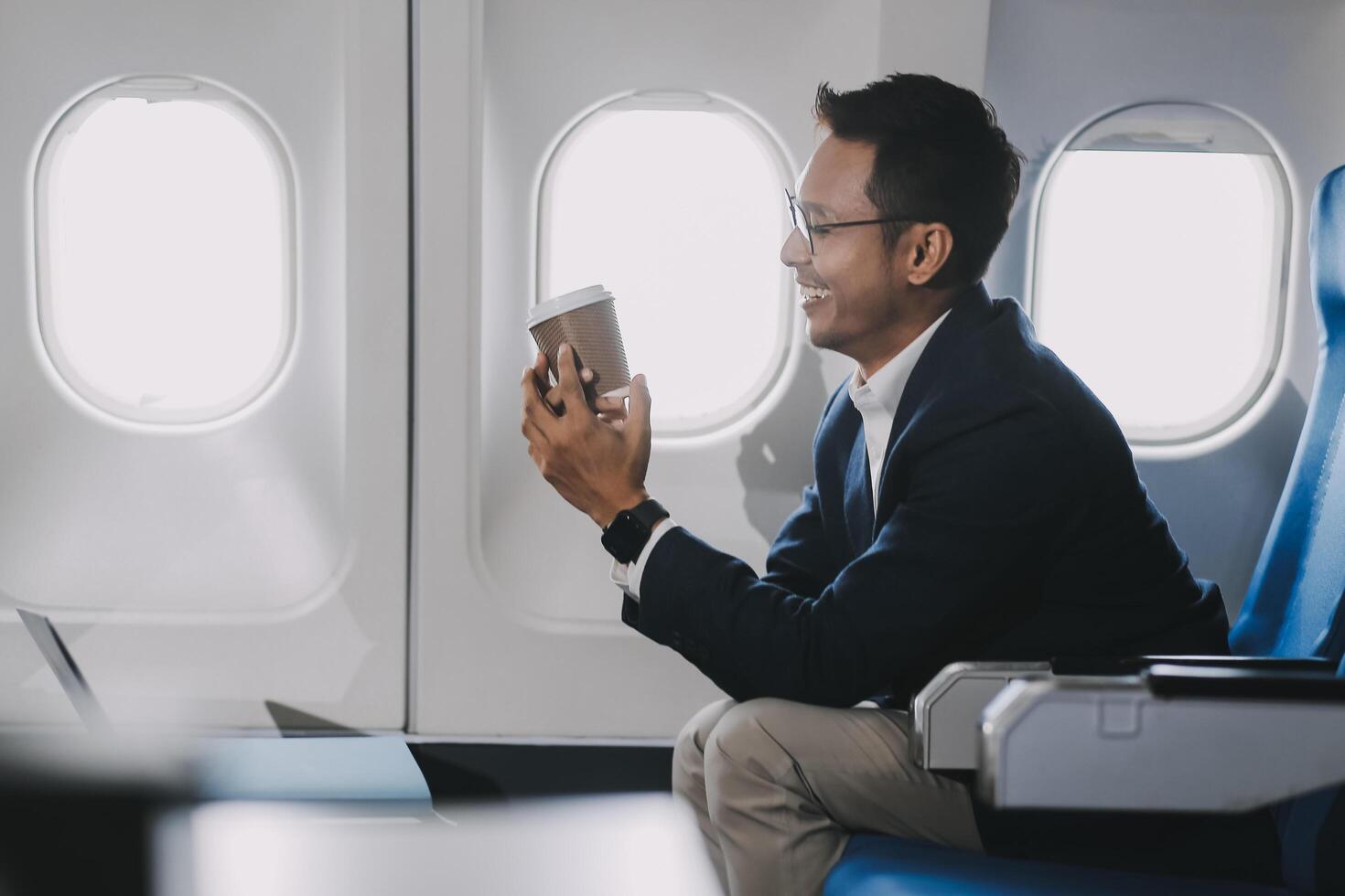 Businessman flying on his private jet. Concept about business, and transportation photo