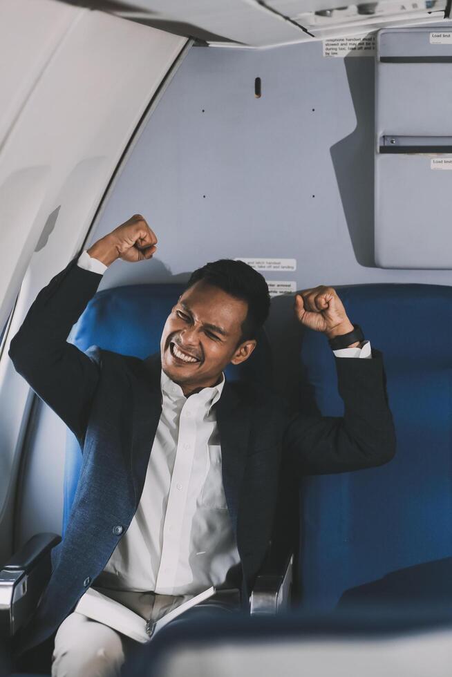 Businessman flying on his private jet. Concept about business, and transportation photo