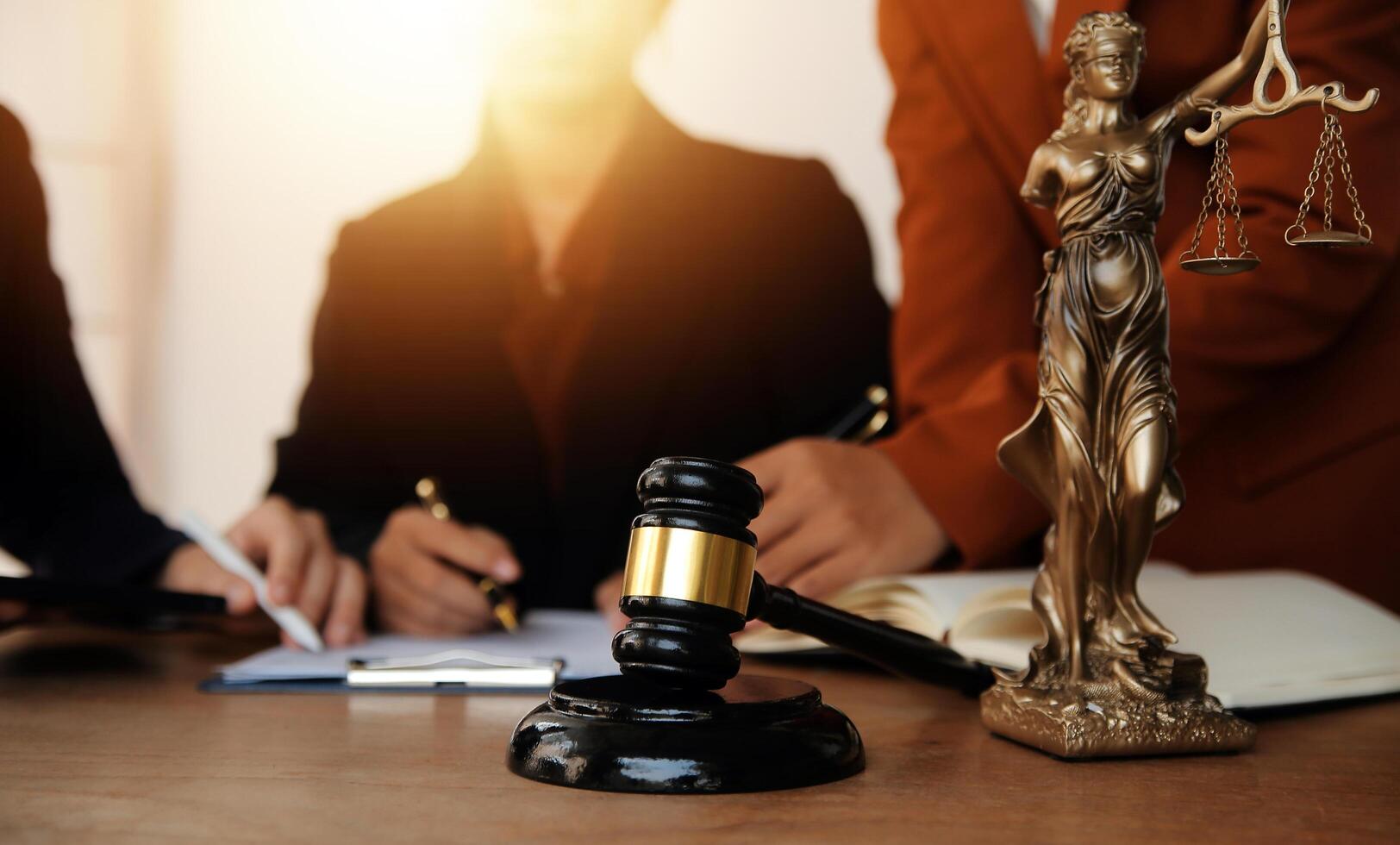 Lawyer, legal advisor, businessman brainstorming information on agreement details Business contracts in legal processing books for accuracy in contract documents. joint financial investment. photo