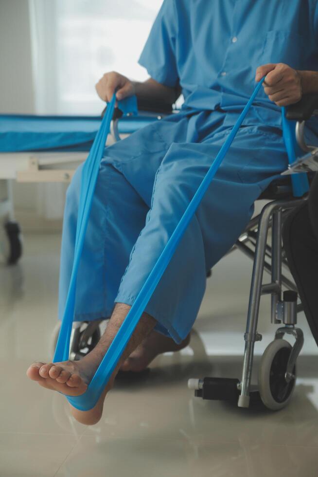 A physiotherapist doing treatment with patient in bright office photo