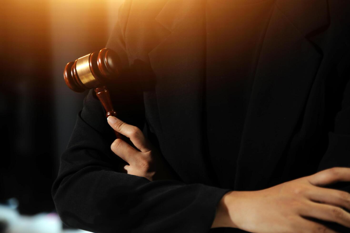 Law theme, gavel or mallet of the judge, lawyer enforcement officers, evidence-based cases taken into account in the court abount business, legislation. photo