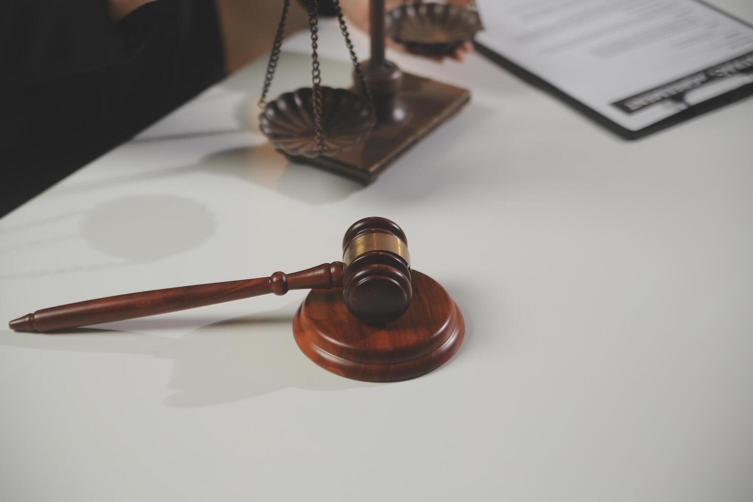 Law theme, gavel or mallet of the judge, lawyer enforcement officers, evidence-based cases taken into account in the court abount business, legislation. photo