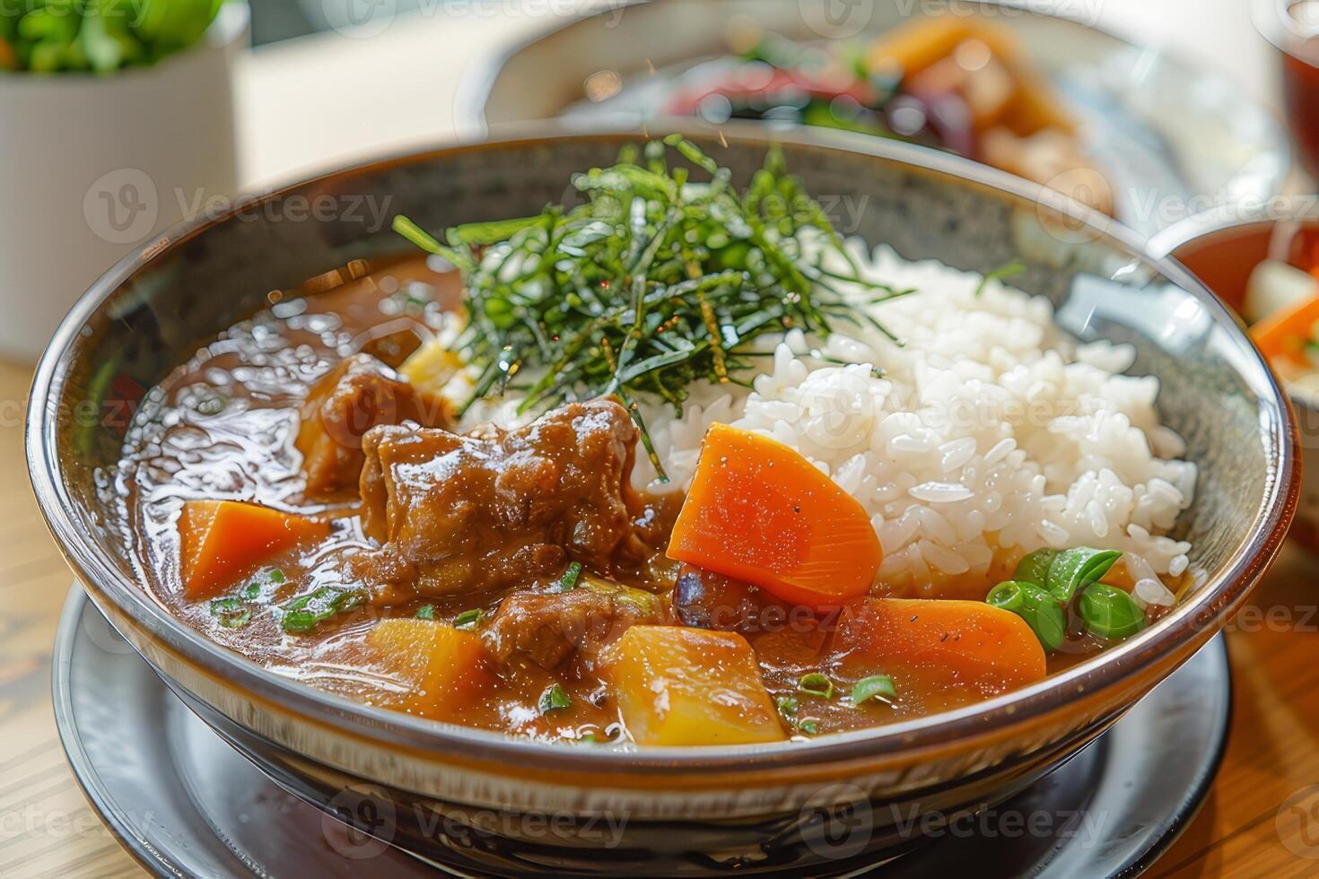 Japanese curry with rice and chives in a bowl on the table. Rice with curry and chicken in a bowl photo