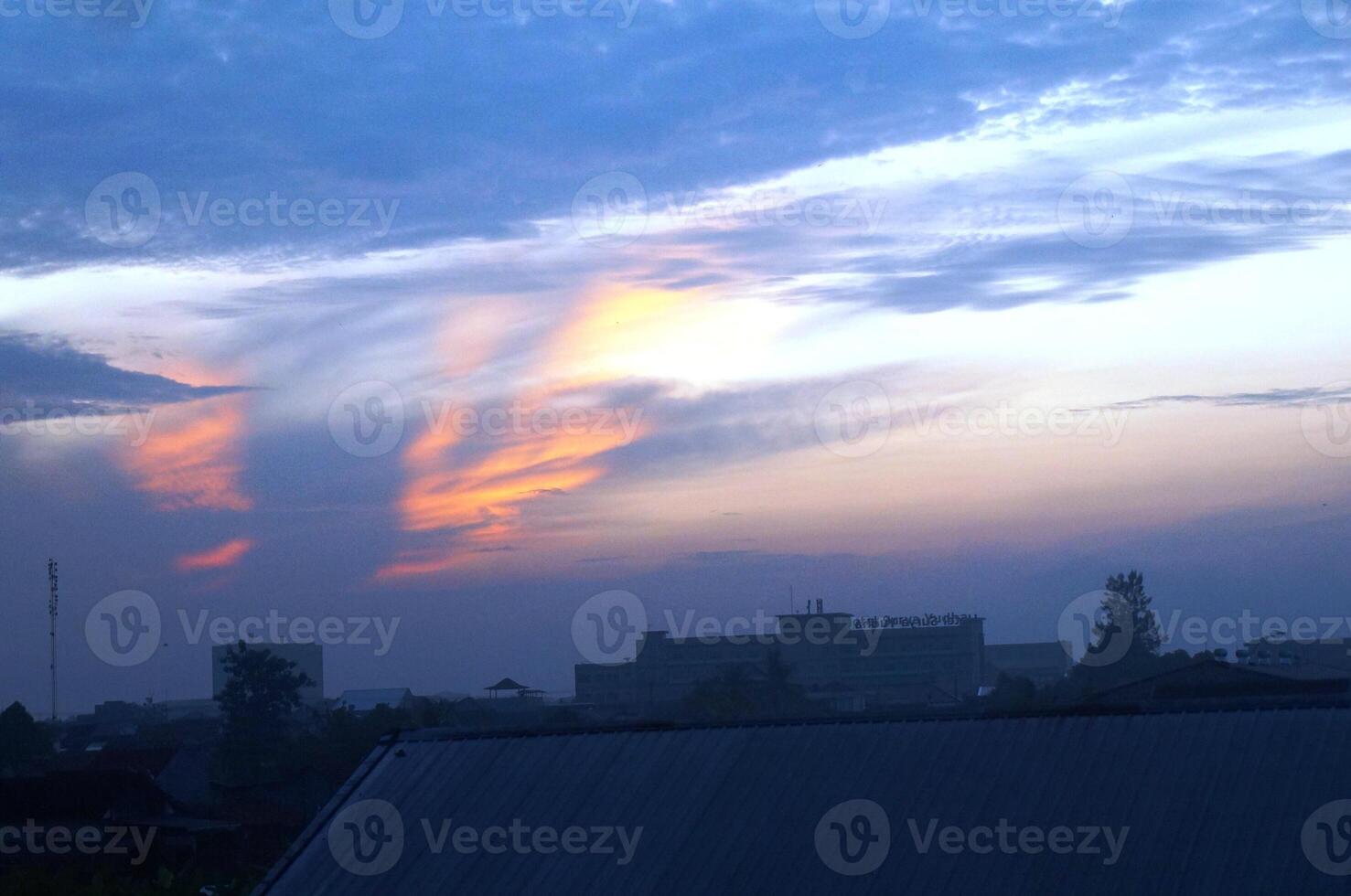 Dramatic morning or evening sky with unique cloud shapes photo