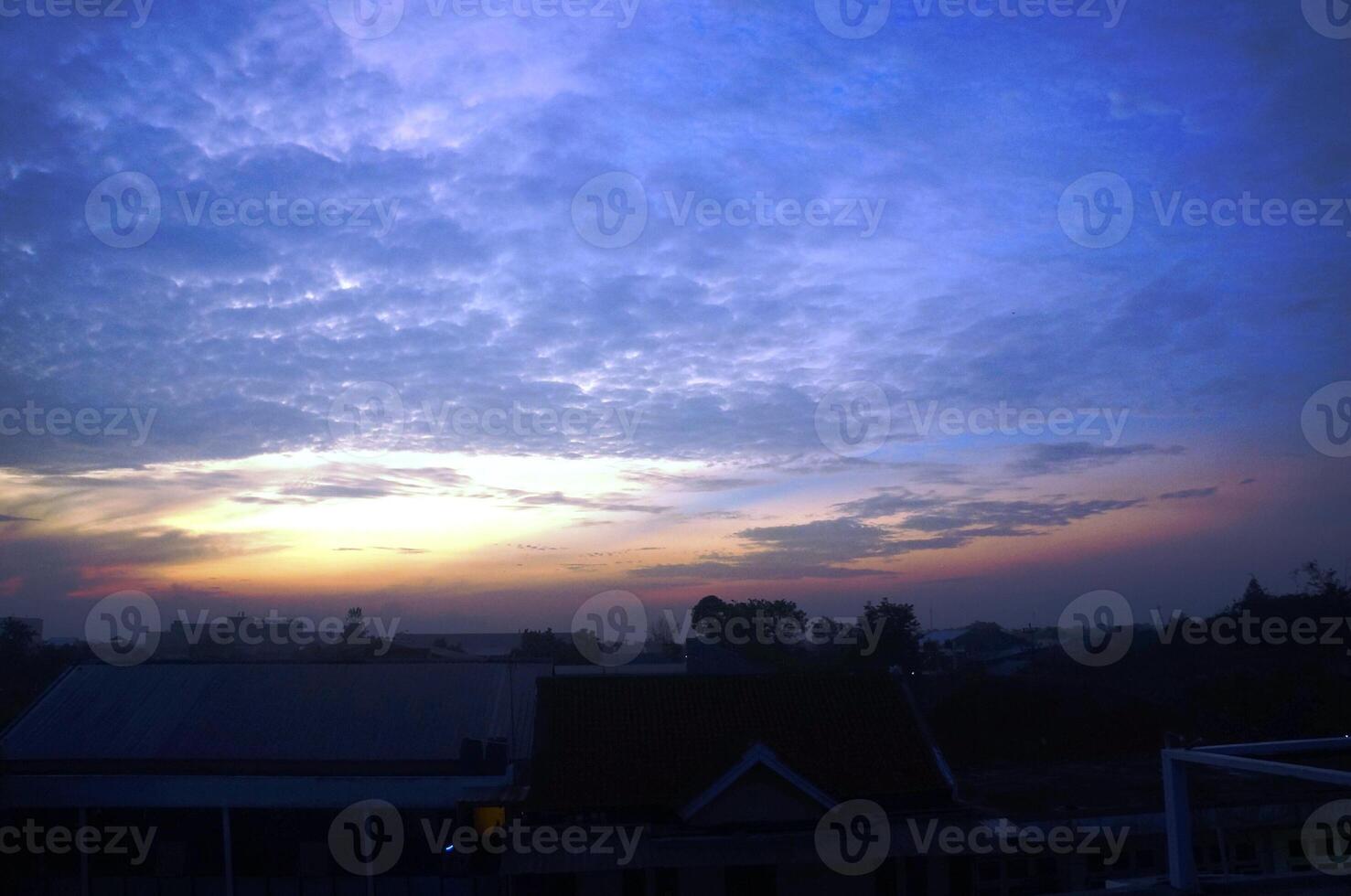 Dramatic morning or evening sky with unique cloud shapes photo