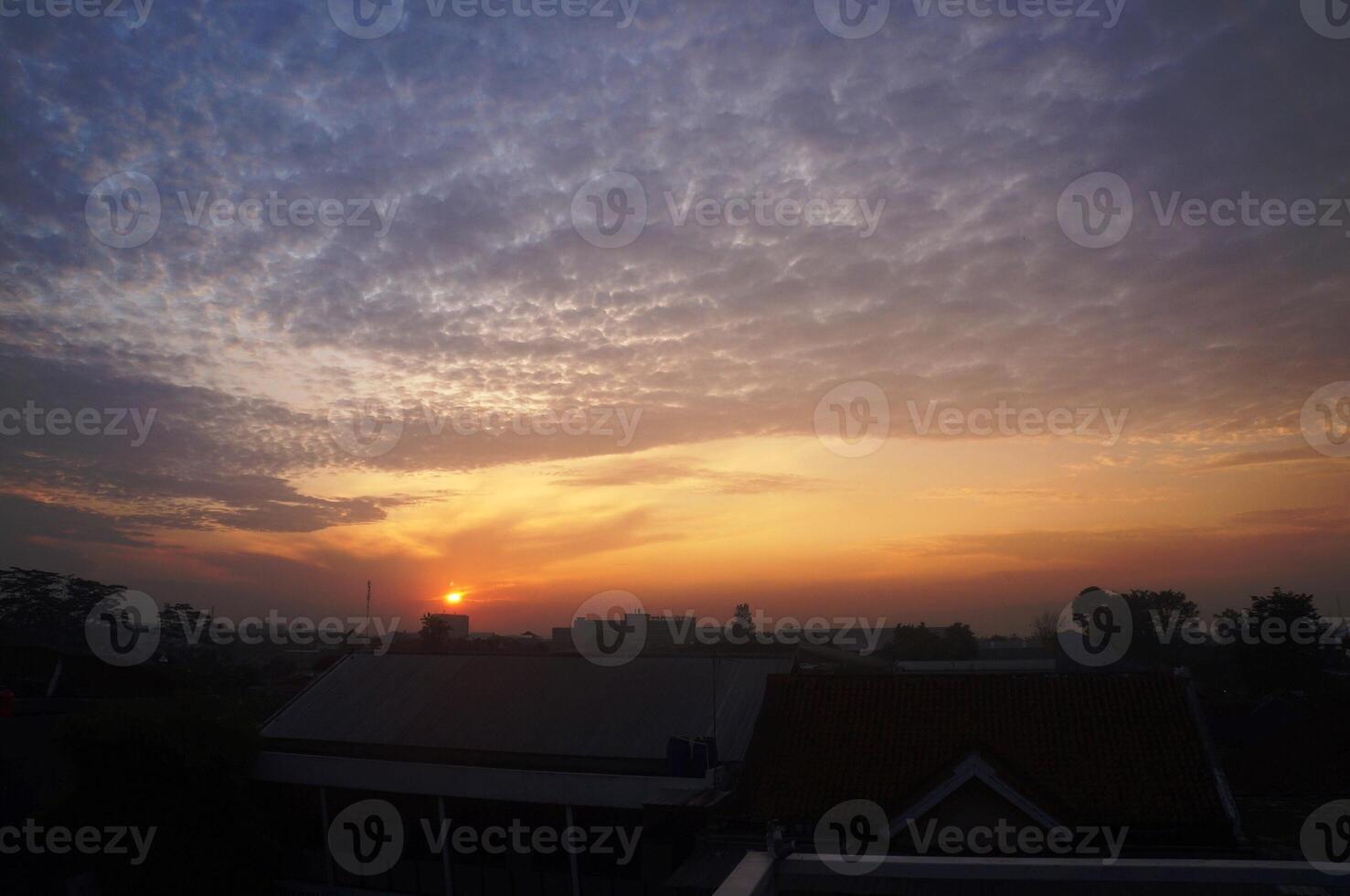 Dramatic morning or evening sky with unique cloud shapes photo