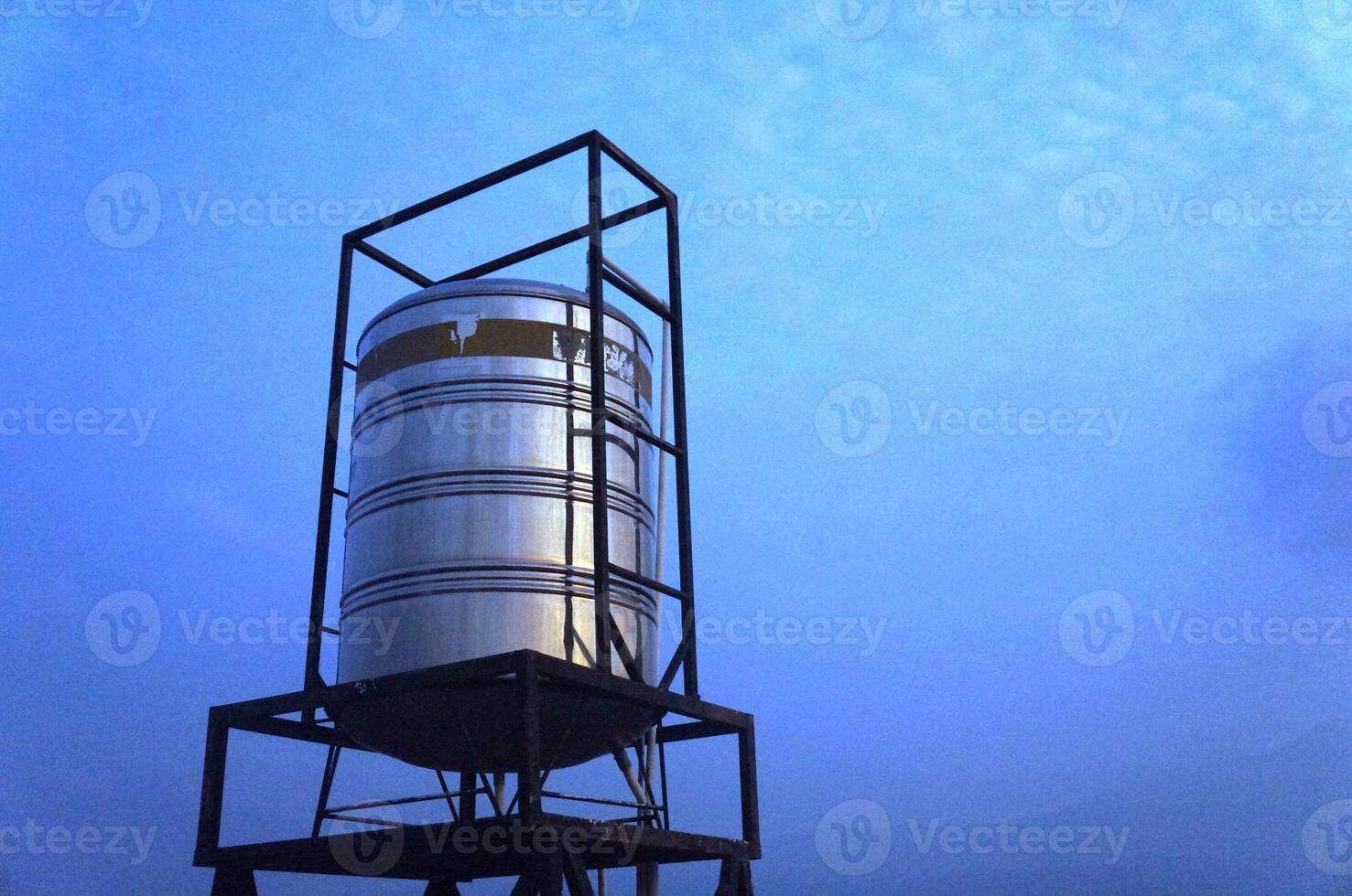 home water tower, Stainless steel water tank on the roof of the building photo