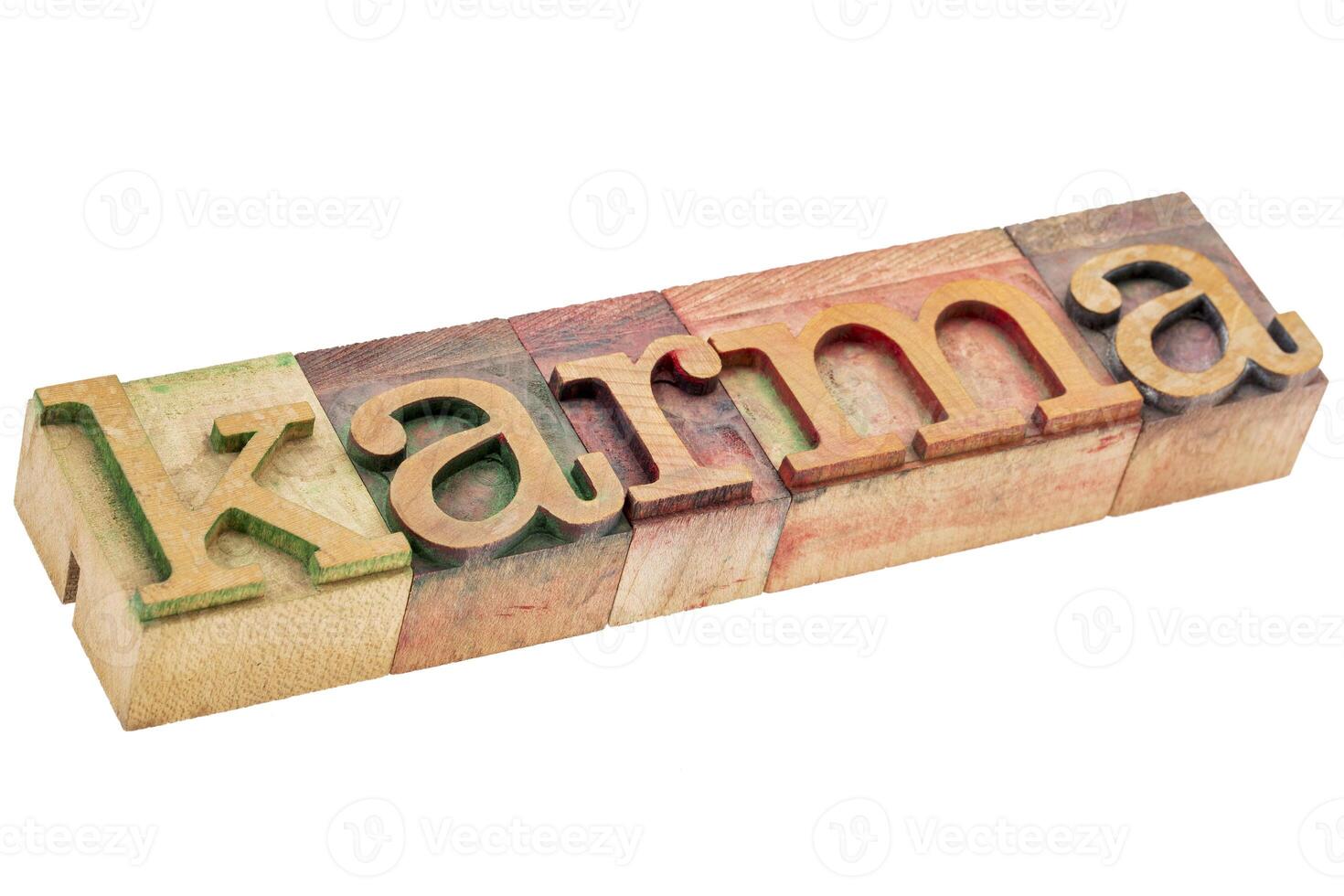 karma word in wood type photo