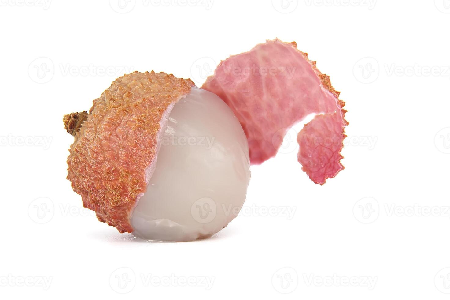 Close-up of a fresh lychee fruit with the peel partially removed, showcasing the juicy white flesh inside photo