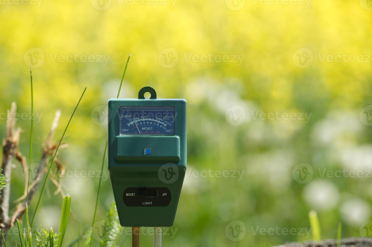 Three way meter PH, light and moisture in the soil photo